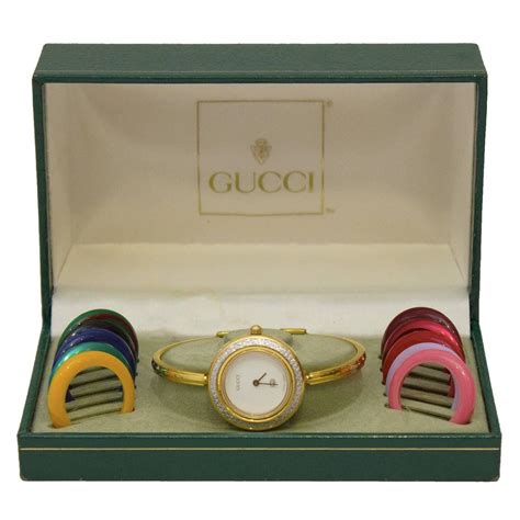 Gucci watch changeable bezels